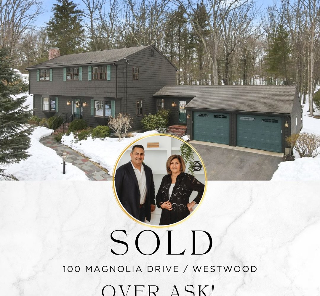 Colonial style home exterior in Westwood MA sold over asking price with winter landscape and attached garage